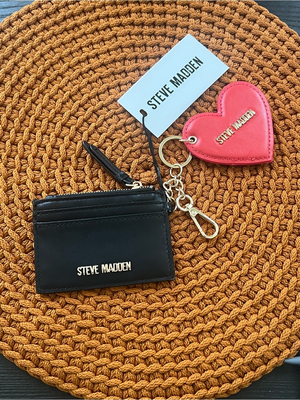 Steve Madden black cardholder with gold hardware and Red heart charm